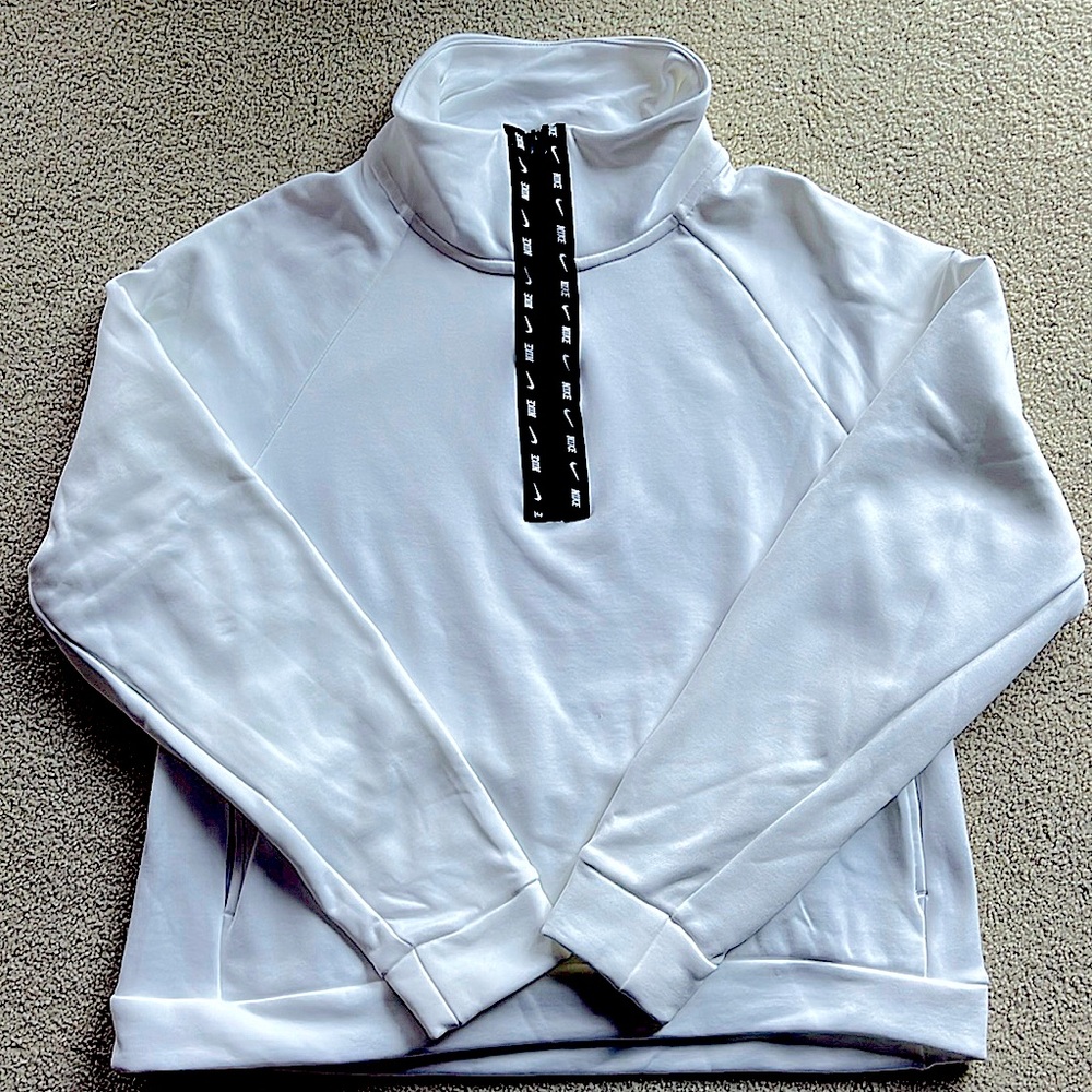 Brand New Never Worn womans white Nike Therma Fit sweat shirt size small.